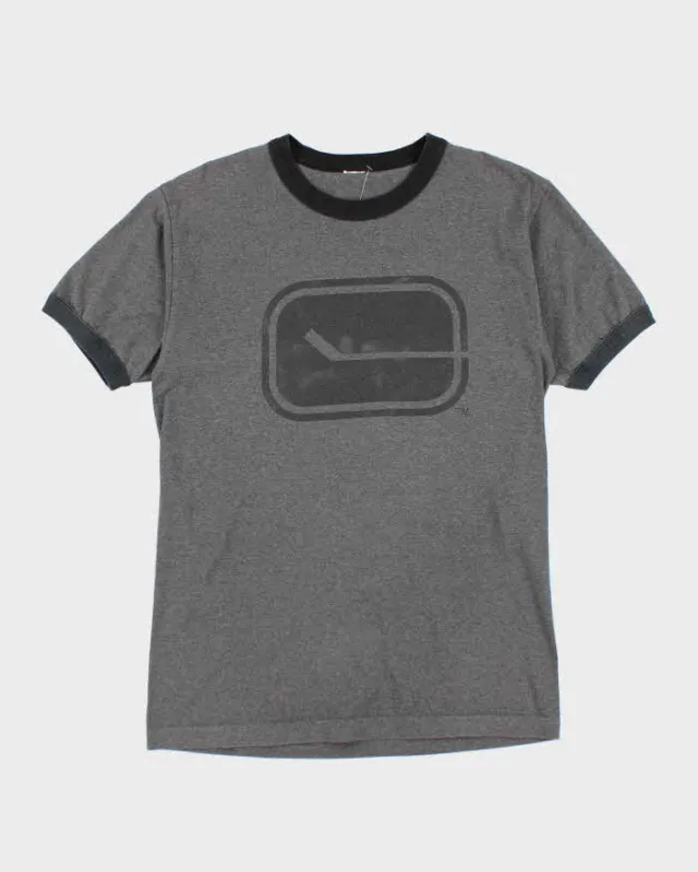 Vintage 90's Vancouver Canucks NHL Graphic T-Shirt - M sold by Rokit