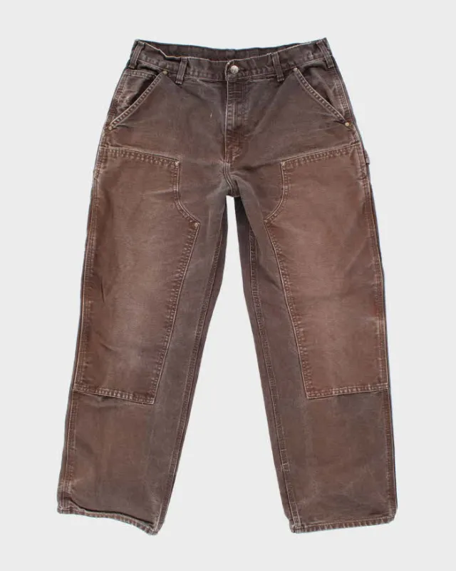 Vintage Carhartt Double Knee Faded Carpenter Trousers - W32 L28 sold by Rokit