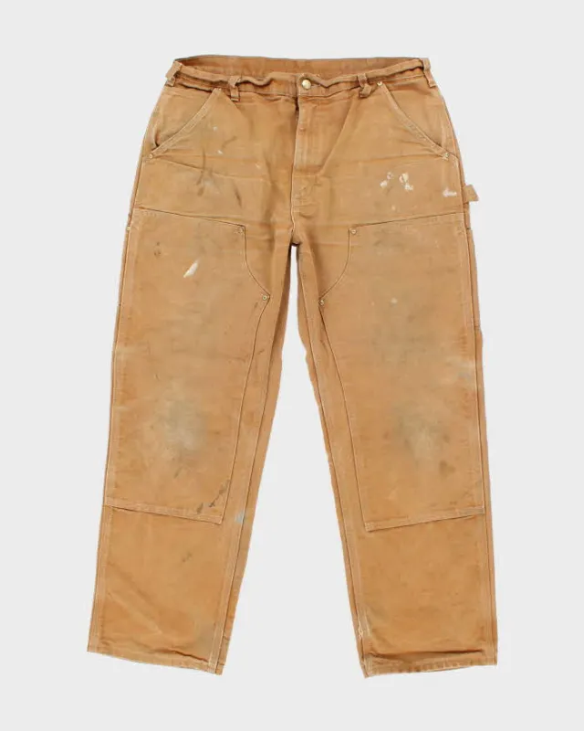 Vintage Carhartt Faded Double Knee Carpenter Trousers - W36 L30 sold by Rokit
