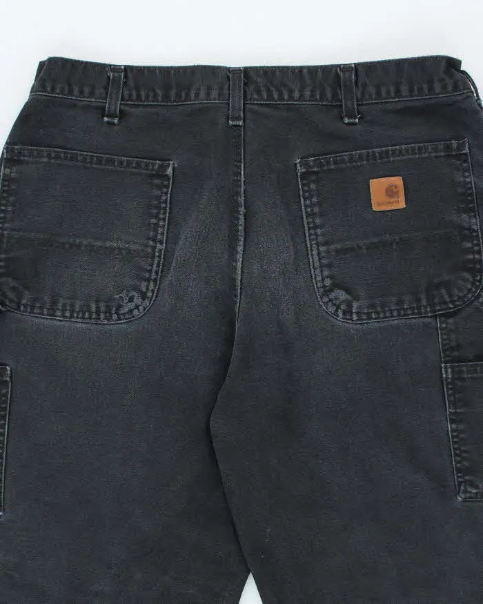 Vintage Carhartt Faded Black Single Knee Carpenter Trousers - W32 L28 sold by Rokit product image thumbnail 4