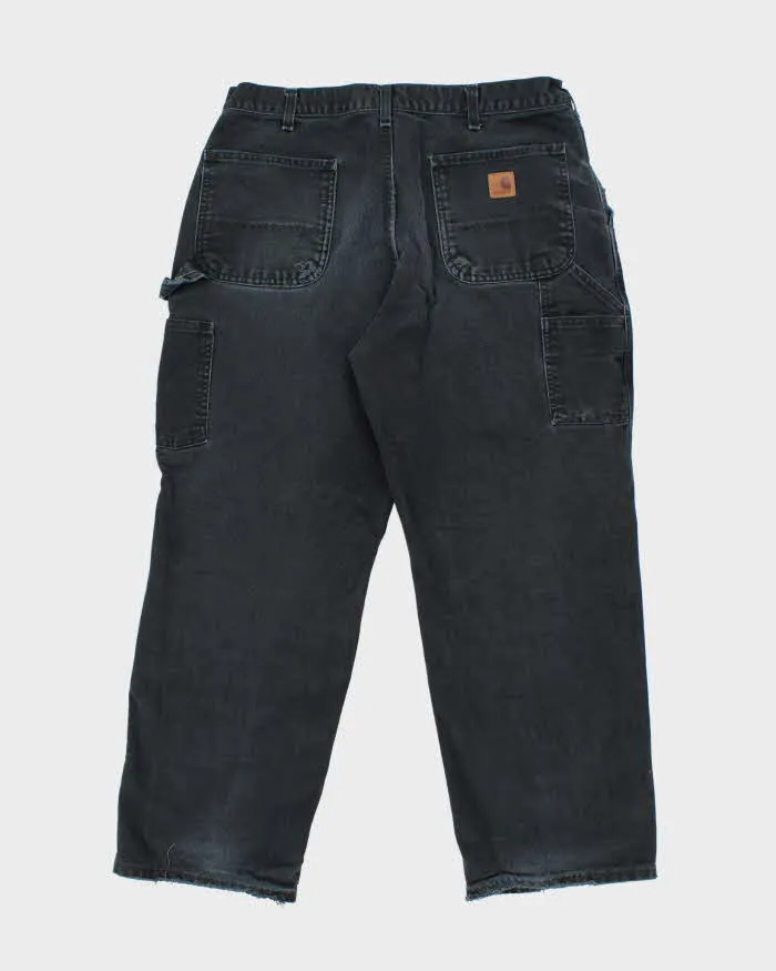 Vintage Carhartt Faded Black Single Knee Carpenter Trousers - W32 L28 sold by Rokit product image thumbnail 2