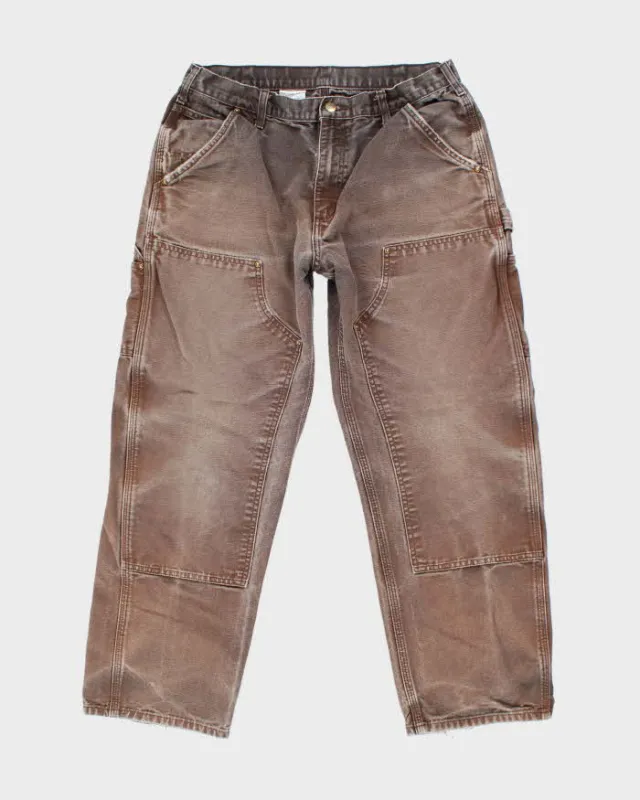Vintage Carhartt Double Knee Faded Carpenter Trousers - W32 L27 sold by Rokit