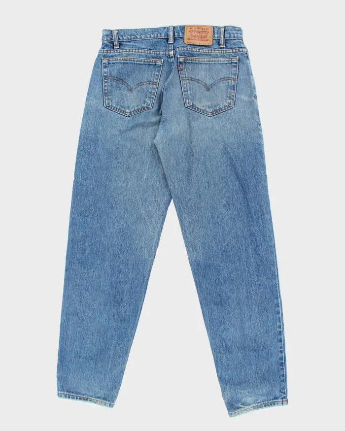 Vintage 90's Levi's 550 Relaxed Fit Medium Wash Jeans - W32 L32 sold by Rokit product image thumbnail 2