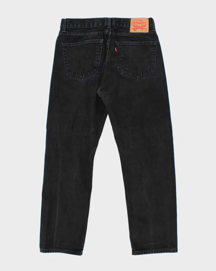 Vintage Levi's 501 Dark Black Wash Straight Fit Jeans - W32 L27 sold by Rokit product image thumbnail 2