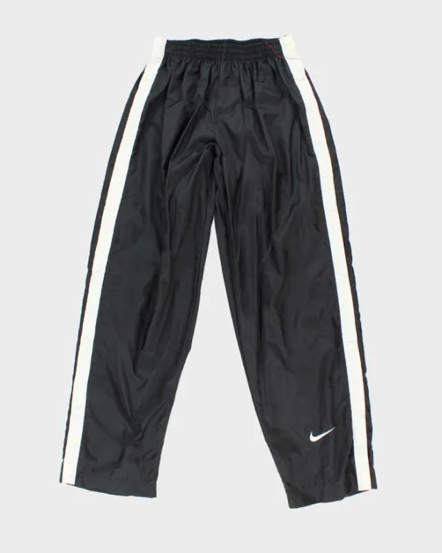 Vintage 90's Nike Seam Popper Lightweight Tracksuit Bottoms - W30 L29 sold by Rokit