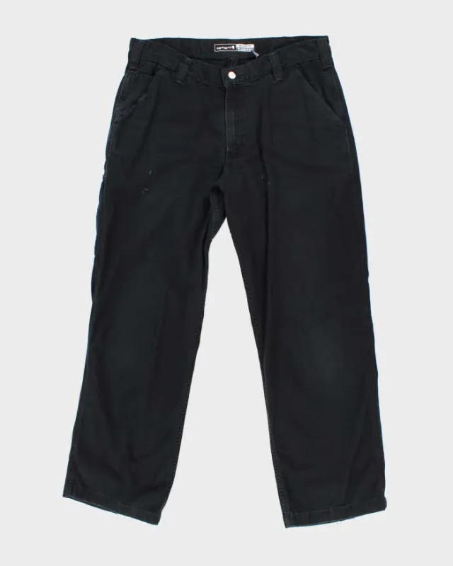 Vintage Carhartt Black Workwear Trousers - W34 L30 sold by Rokit