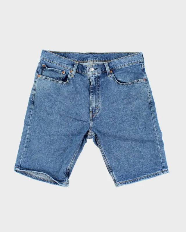 Vintage Levi's 412 Medium Wash Denim Shorts - W32 L10 made by Levi's