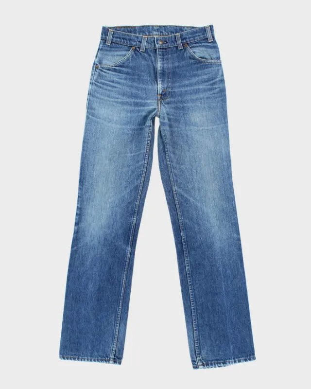 Vintage 80's Women's Levi's Straight Leg Dark Wash Jeans - sold by Rokit