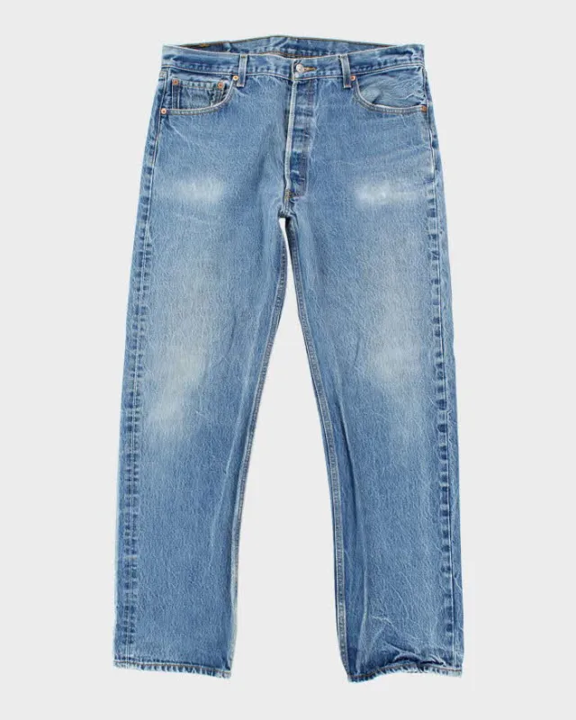 Vintage 90's Levi's 501 Dark Wash Denim Jeans - W36 L33 sold by Rokit