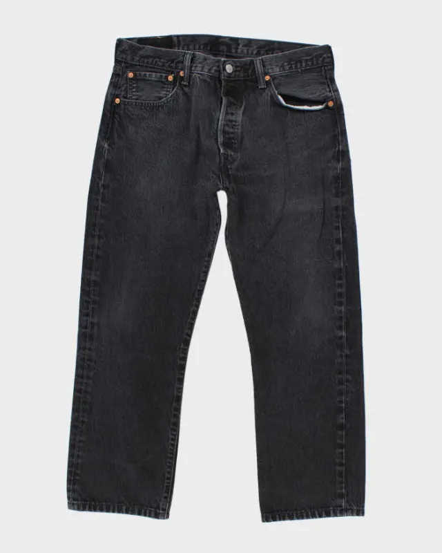 Vintage Levi's 501 Dark Grey Stone Wash Straight Leg Jeans - W34 L25 sold by Rokit
