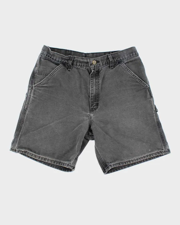 Vintage 90's Carhartt Faded Single Knee Carpenter Shorts - W30 L7 sold by Rokit
