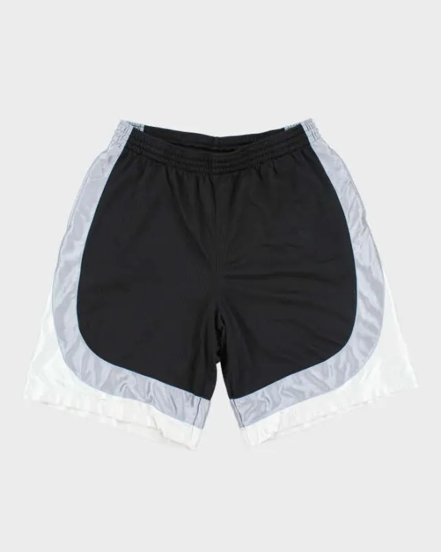 Vintage 2000's Nike Oversized Basketball Shorts - XL sold by Rokit