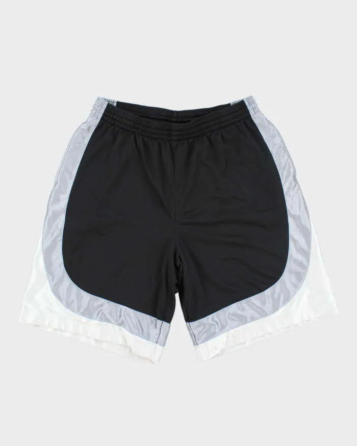 Vintage 2000's Nike Oversized Basketball Shorts - XL sold by Rokit