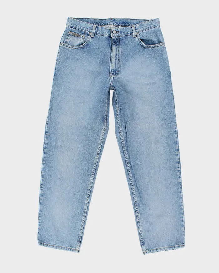 Vintage Calvin Klein Light Wash Jeans - W33 L30 sold by Rokit