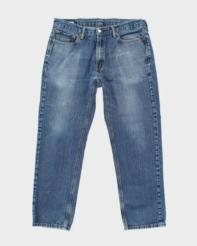 Vintage Levi's 505 Regular Fit Medium Wash Jeans - W34 L29 sold by Rokit