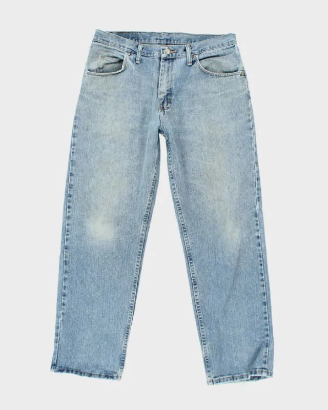 Vintage 90's Wrangler Faded Medium Wash Straight Leg Jeans - W30 L29 sold by Rokit
