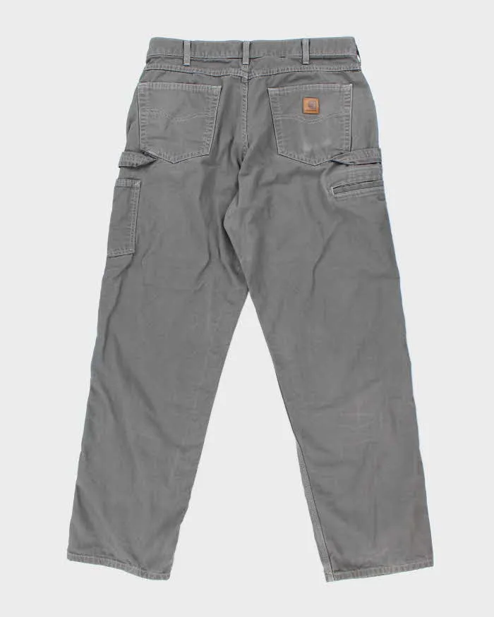 Vintage 90's Carhartt Single Knee Carpenter Trousers - W34 L32 sold by Rokit product image thumbnail 2