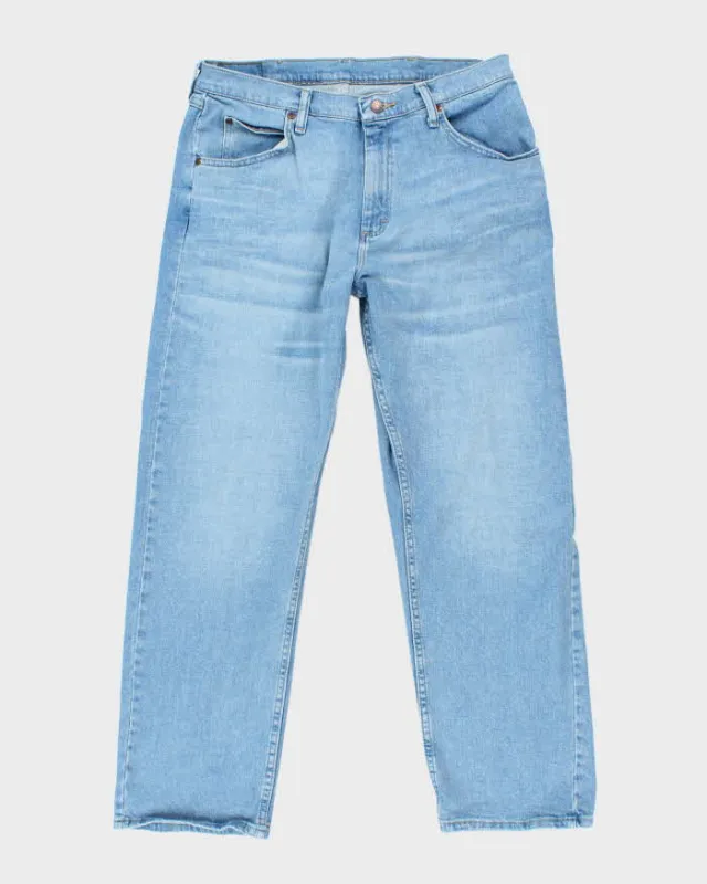 Vintage Wrangler Relaxed Fit Light Wash Jeans - W32 L28 sold by Rokit