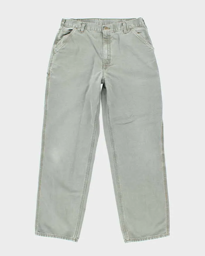 Vintage Carhartt Green Single Knee Carpenter Trousers - W32 L31 sold by Rokit