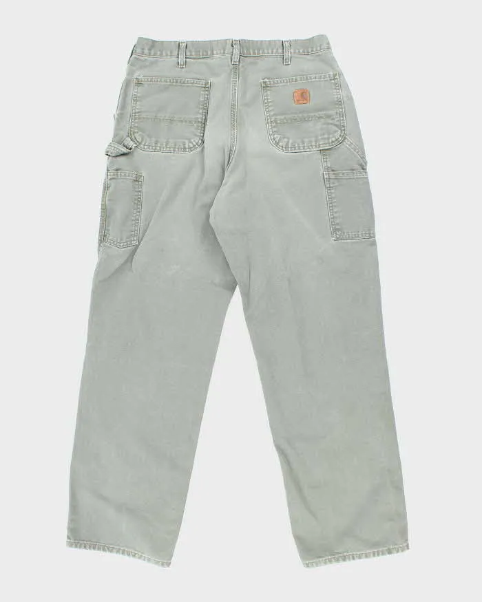 Vintage Carhartt Green Single Knee Carpenter Trousers - W32 L31 sold by Rokit product image thumbnail 2