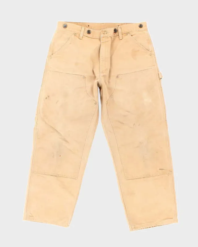 Vintage Carhartt Faded Heavyweight Double Knee Carpenter Trousers - W34 L27 sold by Rokit