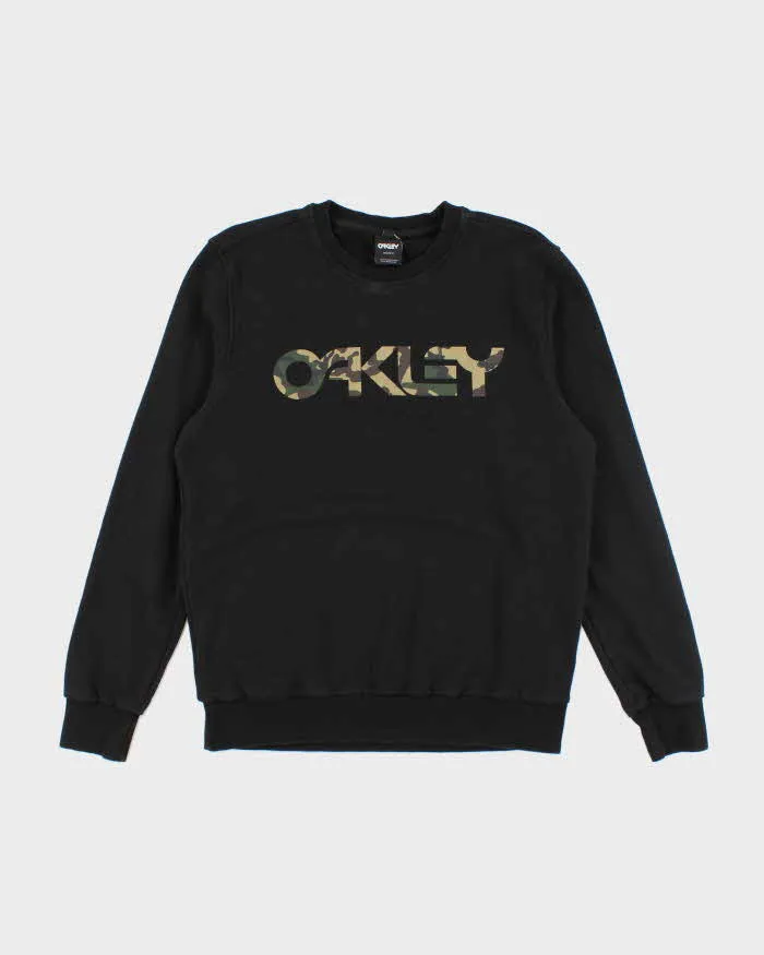 Vintage 2000's Oakley Spell Out Camouflage Logo Sweatshirt - L sold by Rokit