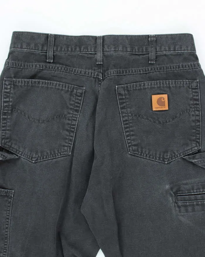 Vintage Carhartt Black Faded Single Knee Carpenter Trousers - W30 L27 sold by Rokit product image thumbnail 4