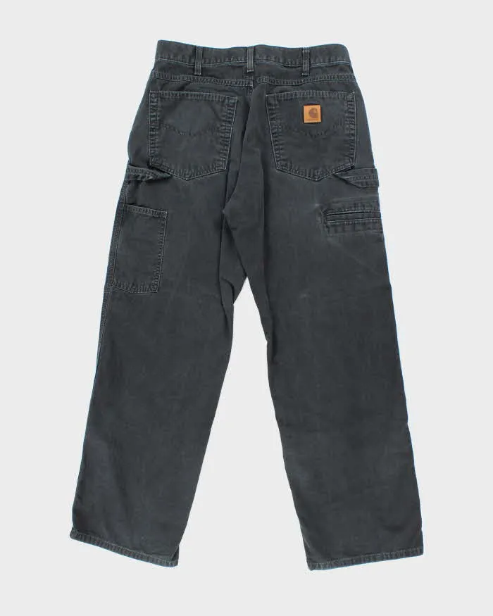 Vintage Carhartt Black Faded Single Knee Carpenter Trousers - W30 L27 sold by Rokit product image thumbnail 2