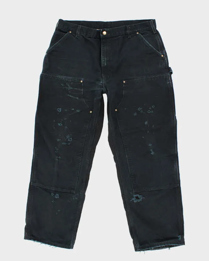 Vintage Carhartt Black Distressed Double Knee Carpenter Trousers - W36 L30 sold by Rokit