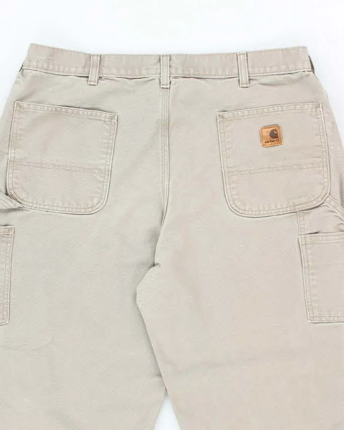 Vintage Carhartt Green Faded Single Knee Carpenter Trousers - W34 L31 sold by Rokit product image thumbnail 4