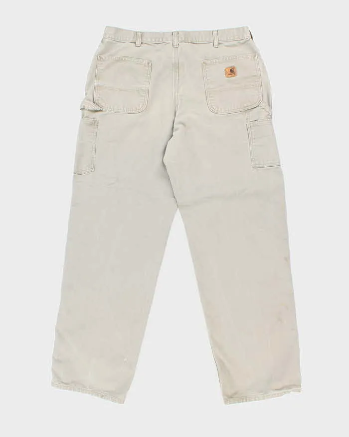 Vintage Carhartt Green Faded Single Knee Carpenter Trousers - W34 L31 sold by Rokit product image thumbnail 2