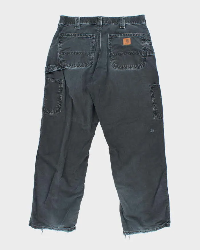 Vintage Carhartt Black Faded Single Knee Carpenter Trousers - W30 L27 sold by Rokit product image thumbnail 2