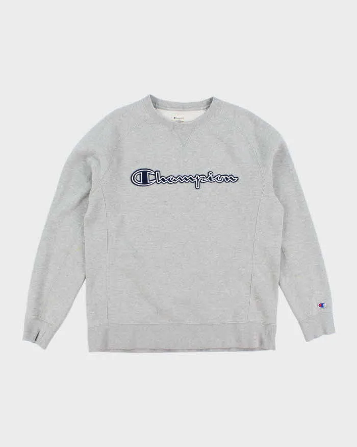 Vintage 2000's Champion Spell Out Logo Sweatshirt - L sold by Rokit