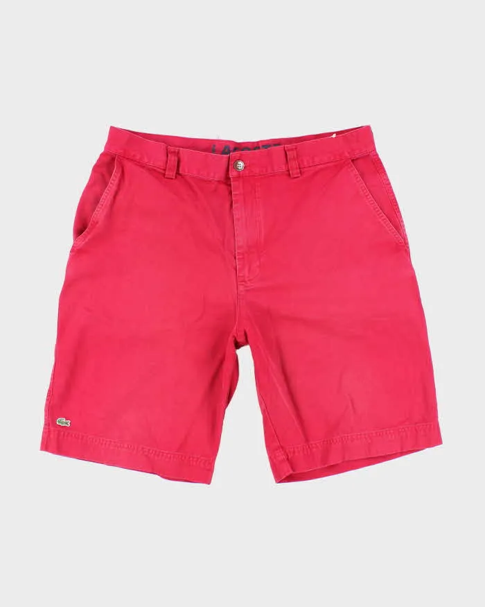 Vintage Lacoste Red Chino Shorts - W34 L10 sold by Rokit
