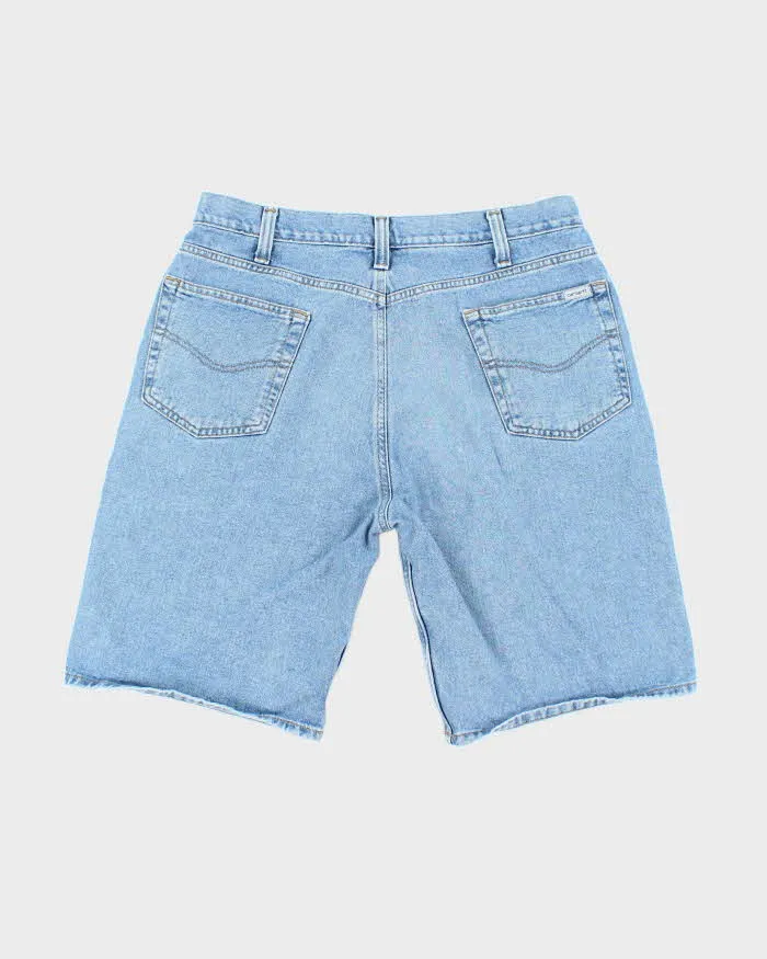 Vintage 2000's Carhartt Light Wash Wide Leg Shorts - W36 L10 sold by Rokit product image thumbnail 2