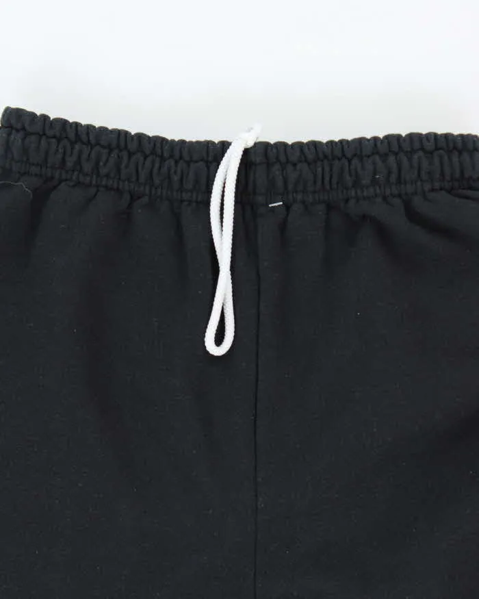 Vintage Y2K Adjustable Flame Print Tracksuit Bottoms - S sold by Rokit product image thumbnail 5