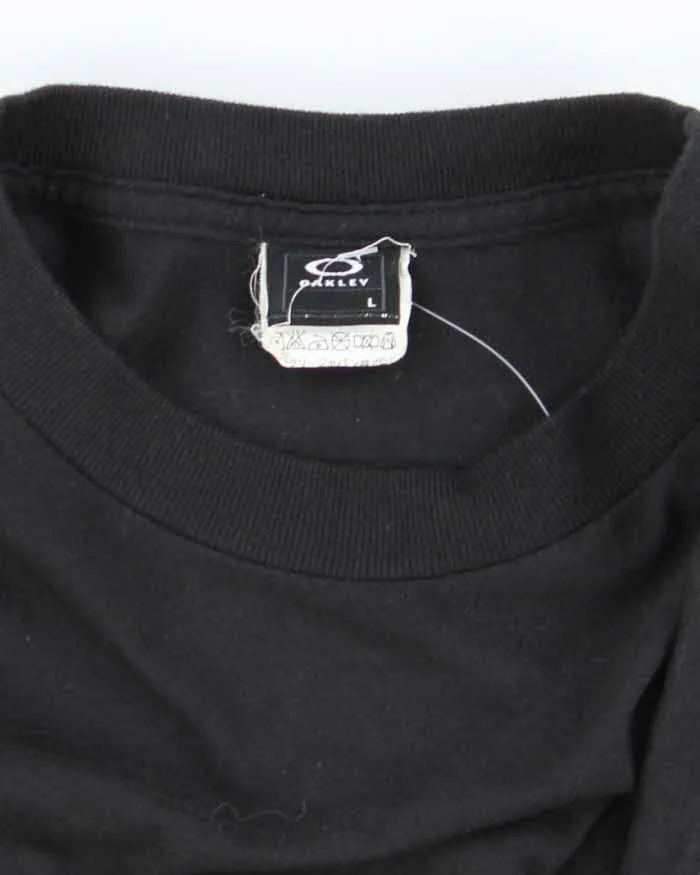 Vintage Y2K Oakley Spell Logo Graphic T-Shirt - L sold by Rokit product image thumbnail 5