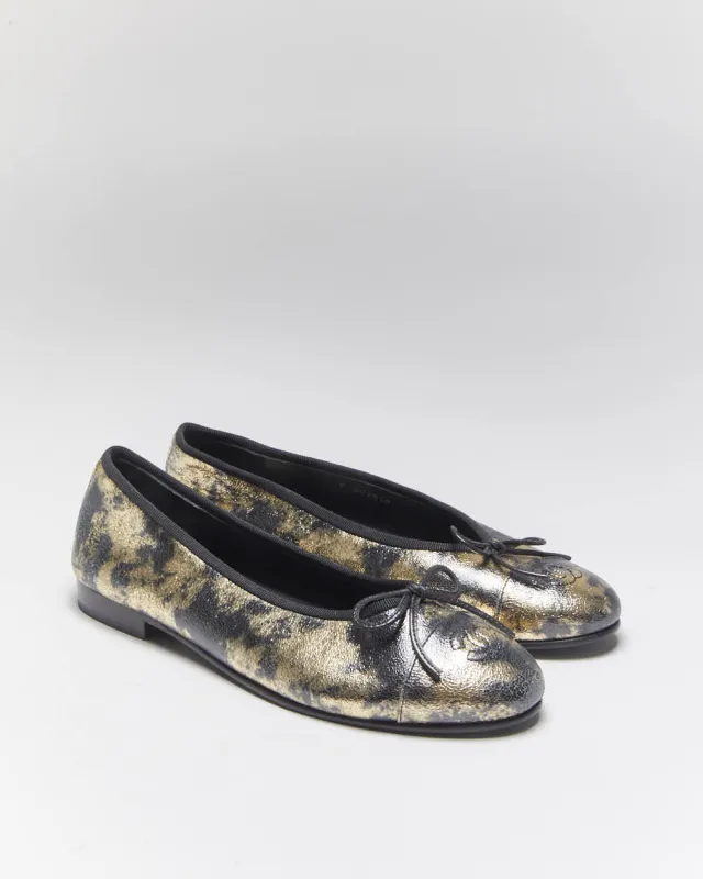 Vintage Chanel Gold & Black Leather - UK5 sold by Rokit