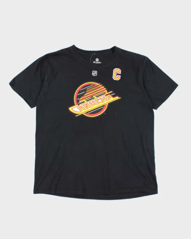 Vintage NHL Canucks T-shirt - XL sold by Rokit