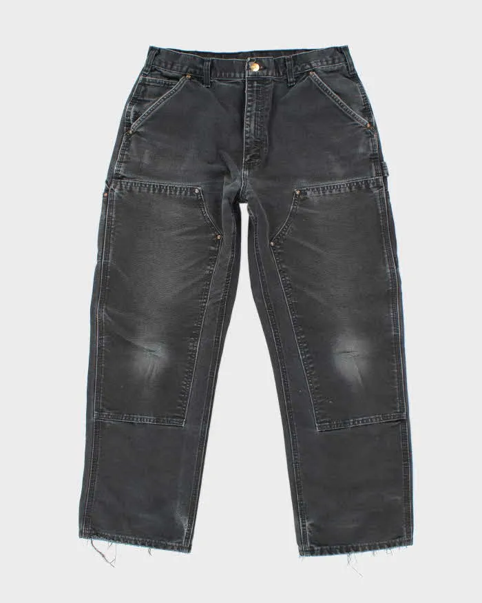 Vintage 2000's Carhartt Faded Double Knee Carpenter Trousers - W32 L27 sold by Rokit