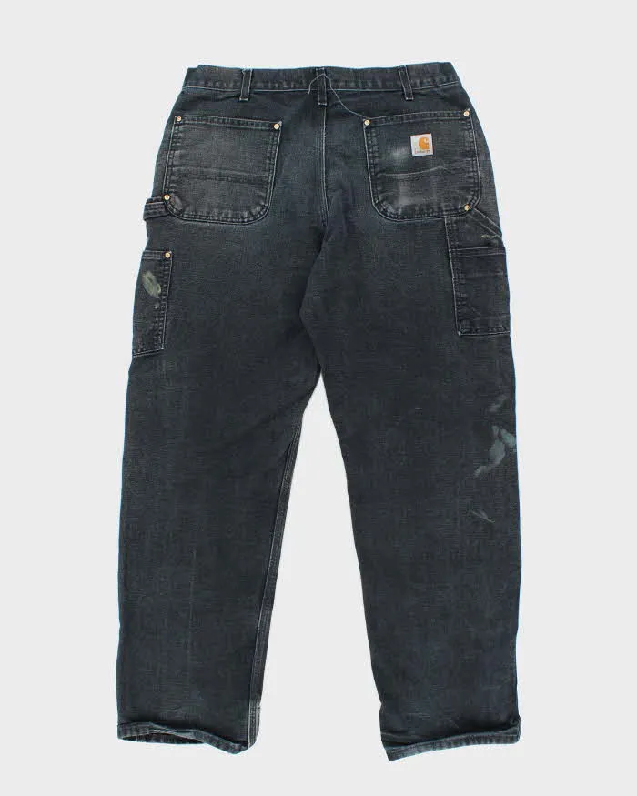 Vintage Carhartt Heavyweight Faded Double Knee Carpenter Trousers - W32 L29 sold by Rokit product image thumbnail 2
