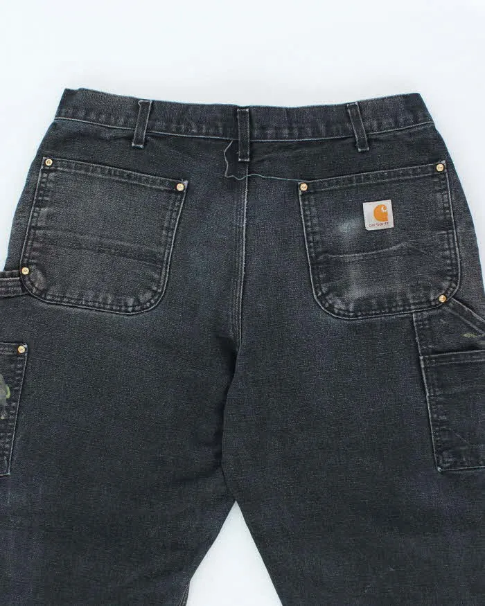 Vintage Carhartt Heavyweight Faded Double Knee Carpenter Trousers - W32 L29 sold by Rokit product image thumbnail 4