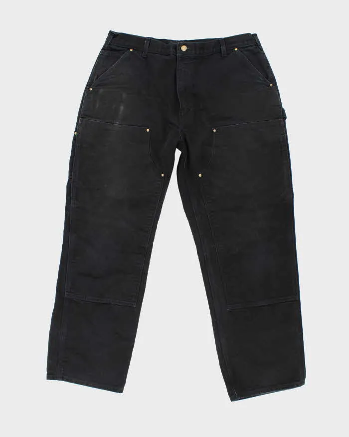 Vintage Carhartt Heavyweight Double Knee Carpenter Trousers - W34 L30 sold by Rokit