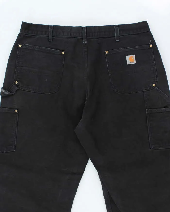 Vintage Carhartt Heavyweight Double Knee Carpenter Trousers - W34 L30 sold by Rokit product image thumbnail 4