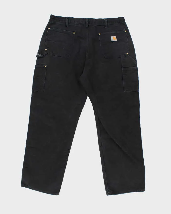 Vintage Carhartt Heavyweight Double Knee Carpenter Trousers - W34 L30 sold by Rokit product image thumbnail 2