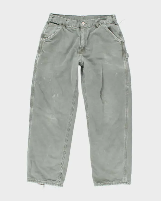 Vintage Carhartt Heavyweight Faded Lined Carpenter Trousers - W32 L29 sold by Rokit