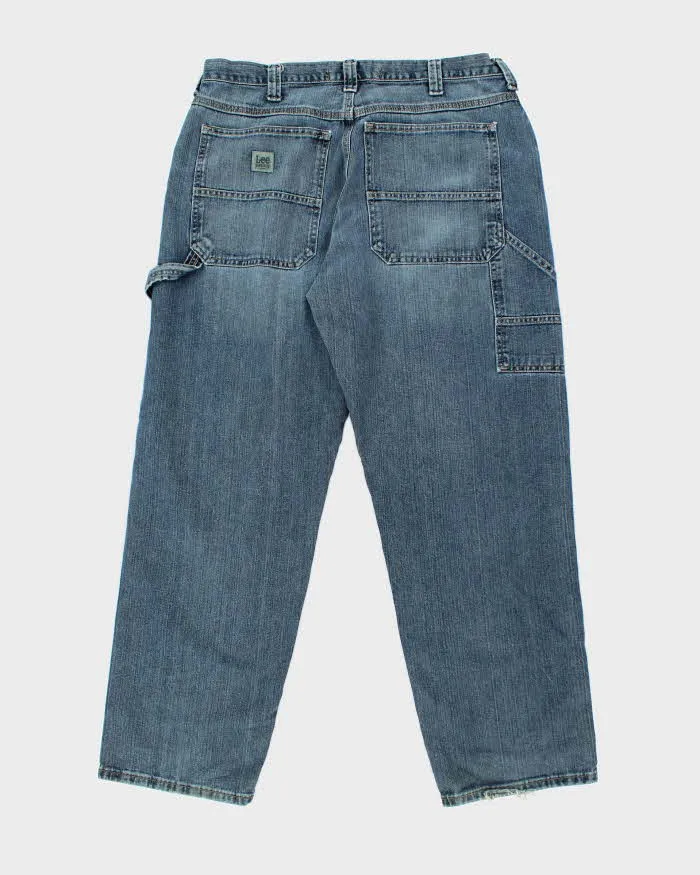 Vintage Y2K Wrangler Medium Wash Carpenter Jeans - W34 L31 sold by Rokit product image thumbnail 2