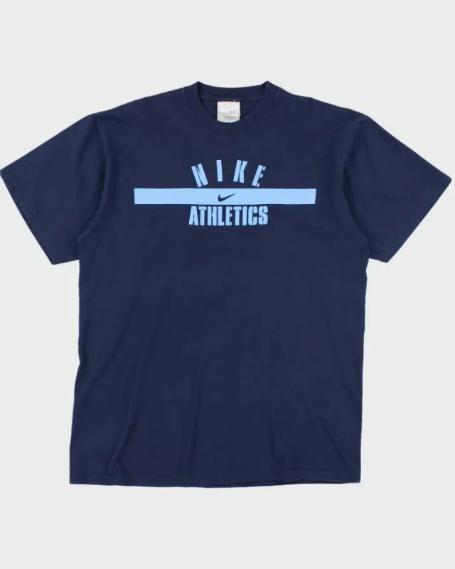 Vintage Y2K Nike Athletics Graphic T-Shirt - L sold by Rokit
