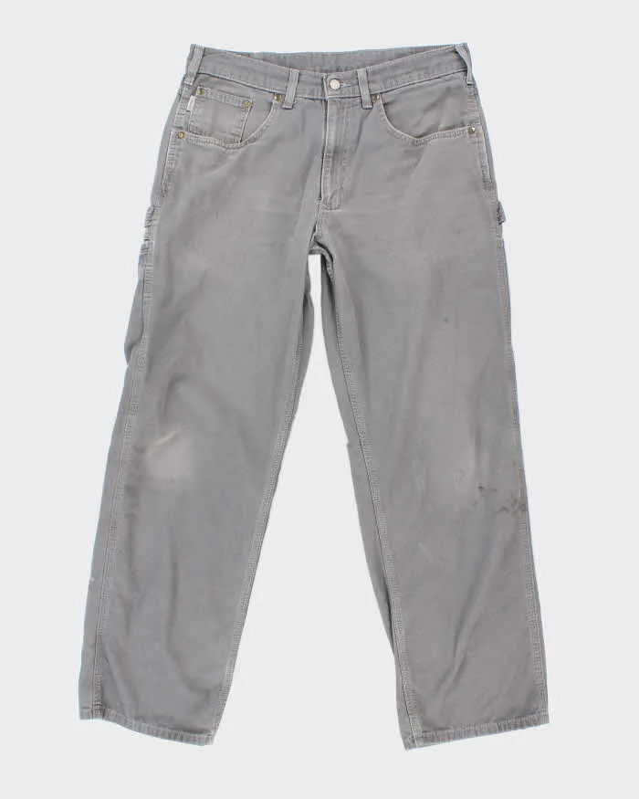 Vintage 2000's Carhartt Faded Single Knee Carpenter Trousers - W34 L29 sold by Rokit