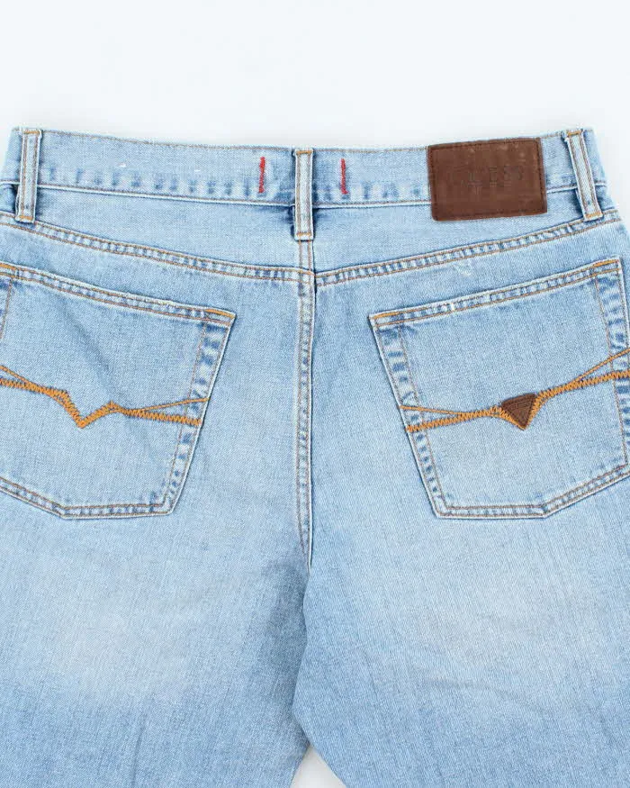 Vintage Y2K Guess Medium Wash Denim Shorts - W32 L11 sold by Rokit product image thumbnail 4